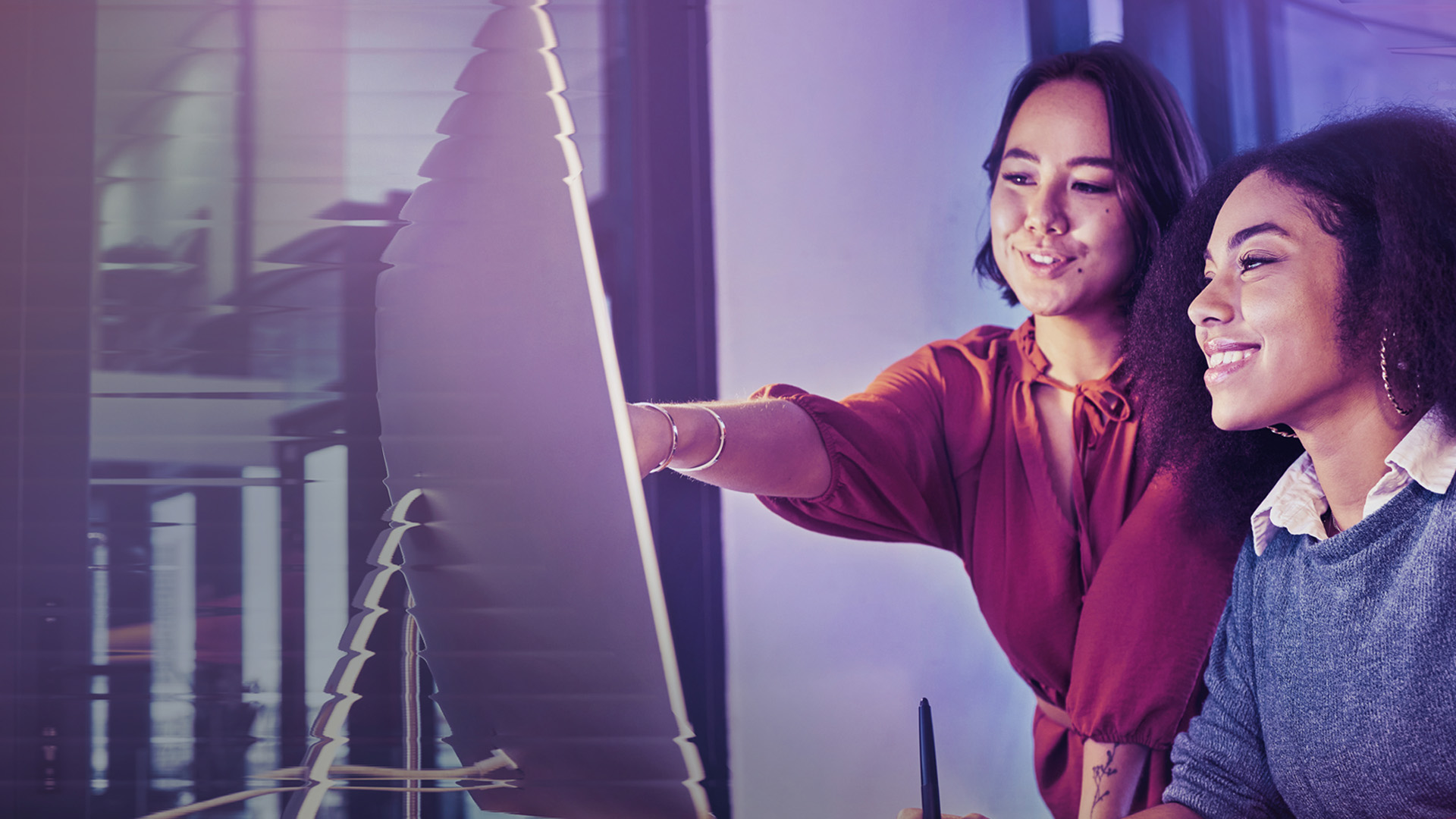 Image of two smart women working together
