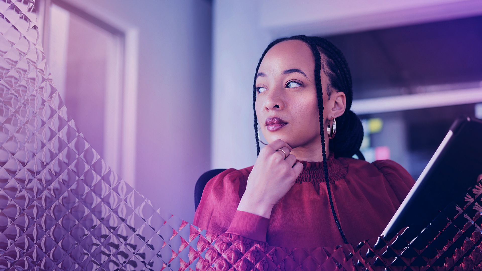 Image of a woman holding a tablet