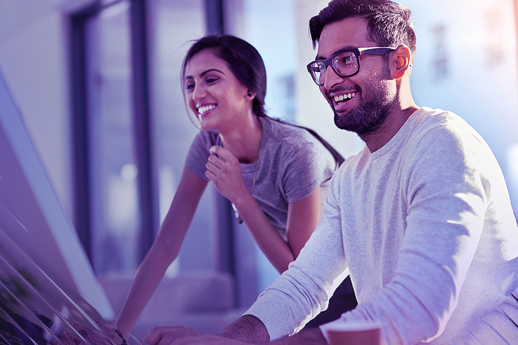 Image of two colleagues working together