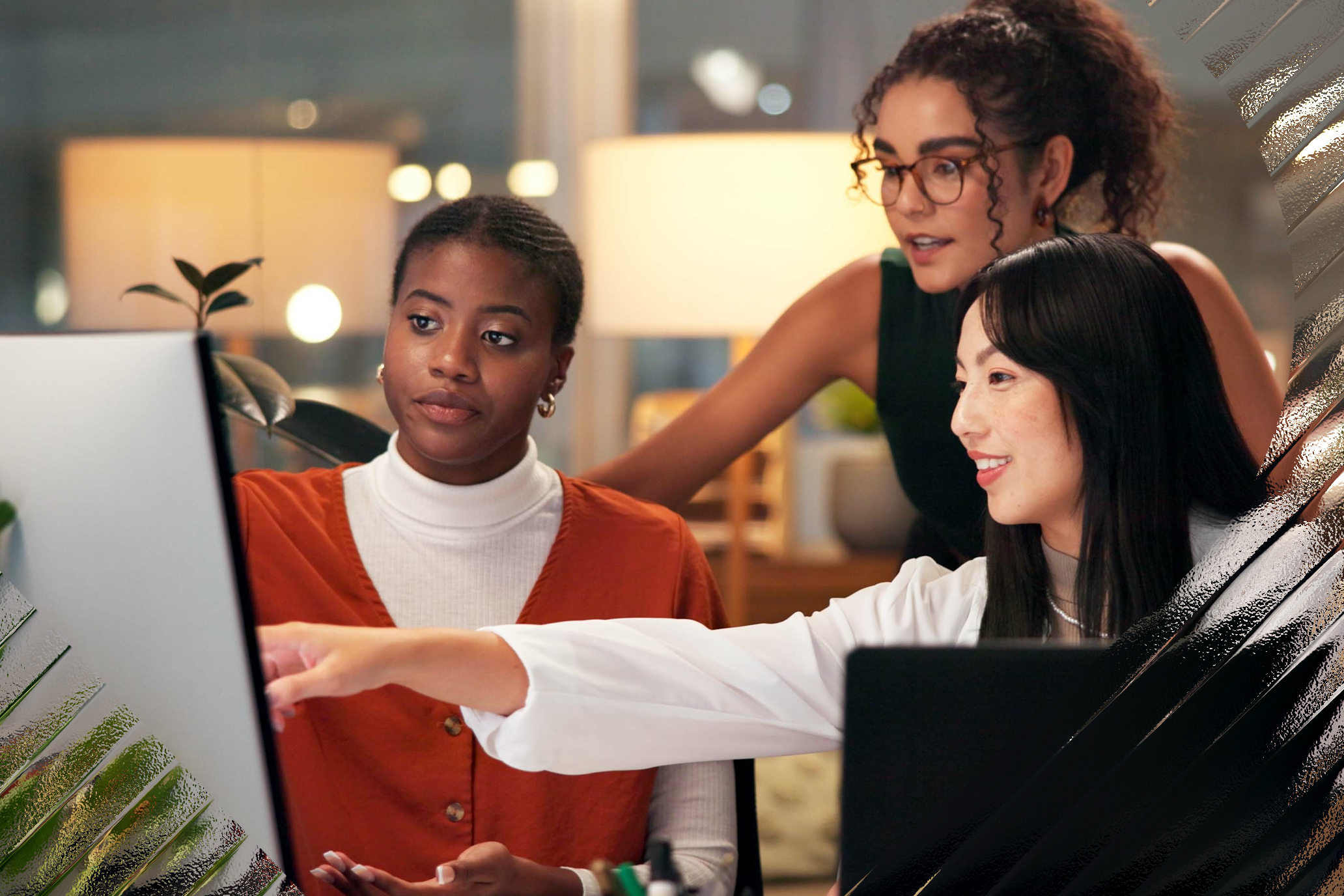 Image of three women working together