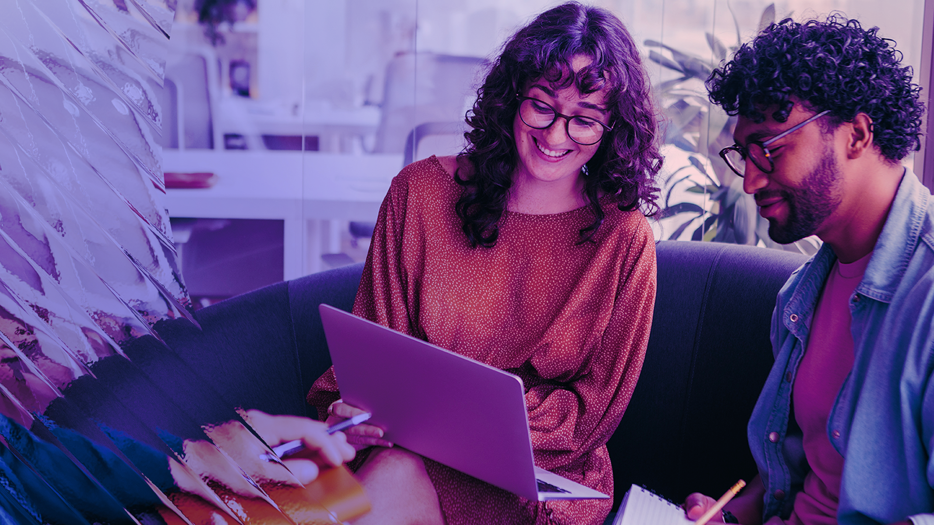 Image of two co-workers talking
